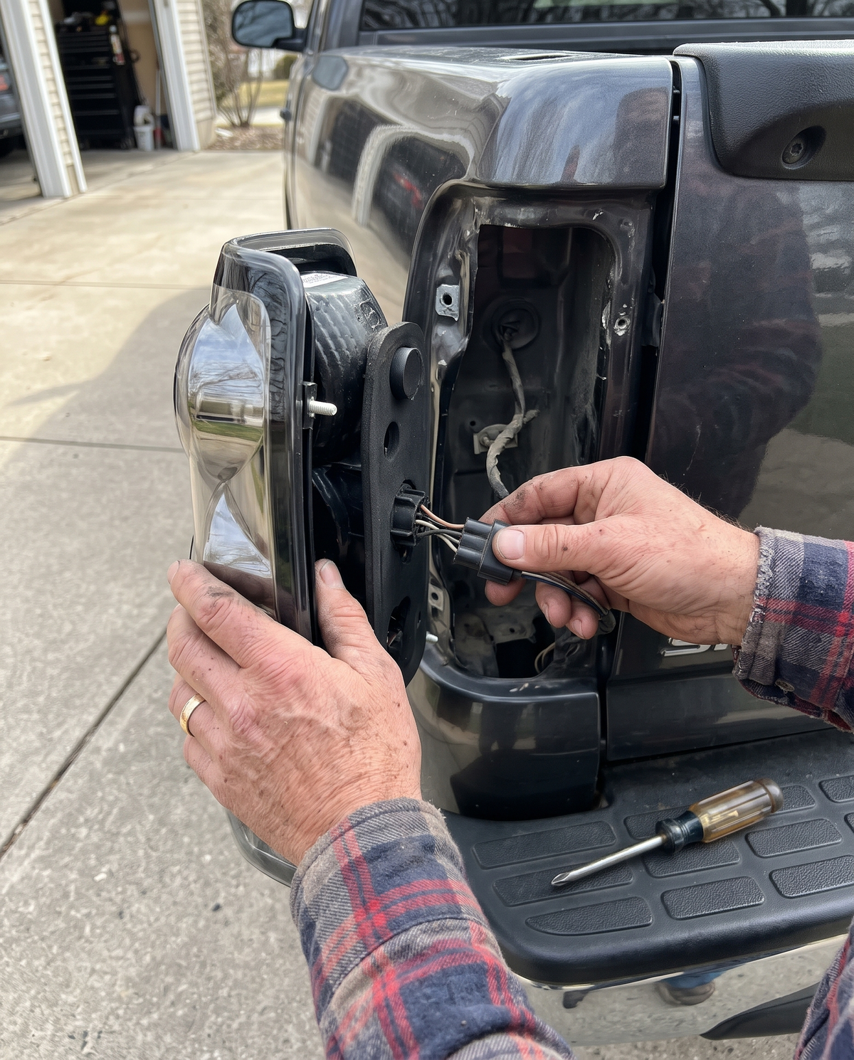 Plugging the factory connector into the new tail light