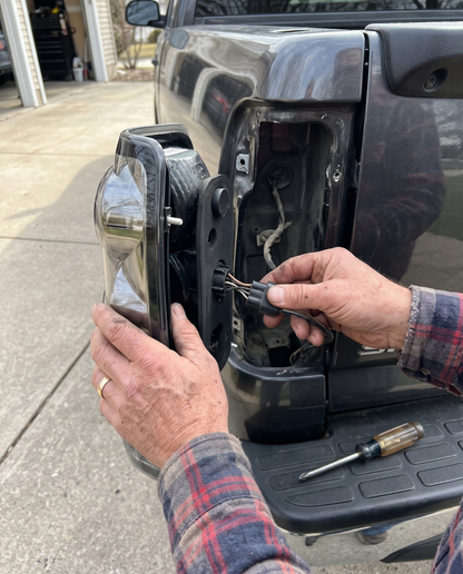 Plugging the factory connector into the new tail light